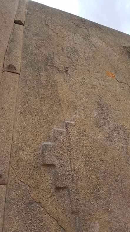 A close up of an unfinished Incan cross on the Wall of the Six Monoliths.