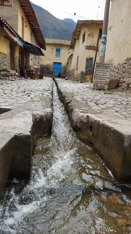 The Incans had drainage channels running down the middle of the street.