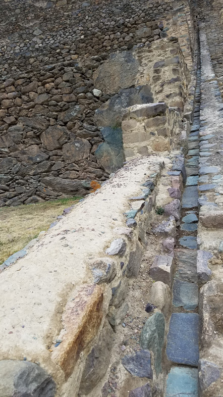 The terraces have an irrigation system. There are holes in the wall were you can divert the water flow into the terrace.